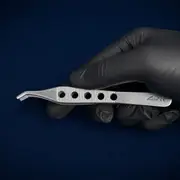 Forceps — Curved — in hand.DOPDNw2b